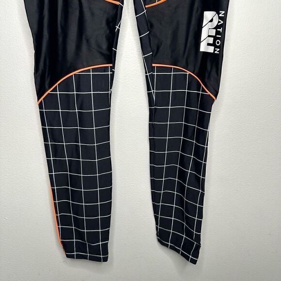 P.E Nation The Hammer Throw Legging Black/White Graph Paper Print Orange Piping - Picture 7 of 12